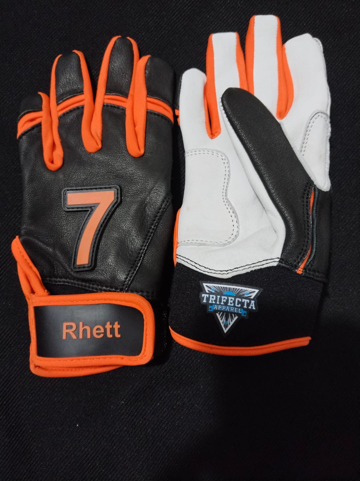 Custom baseball/softball glove with leather front and neoprene cuff for durability and comfort