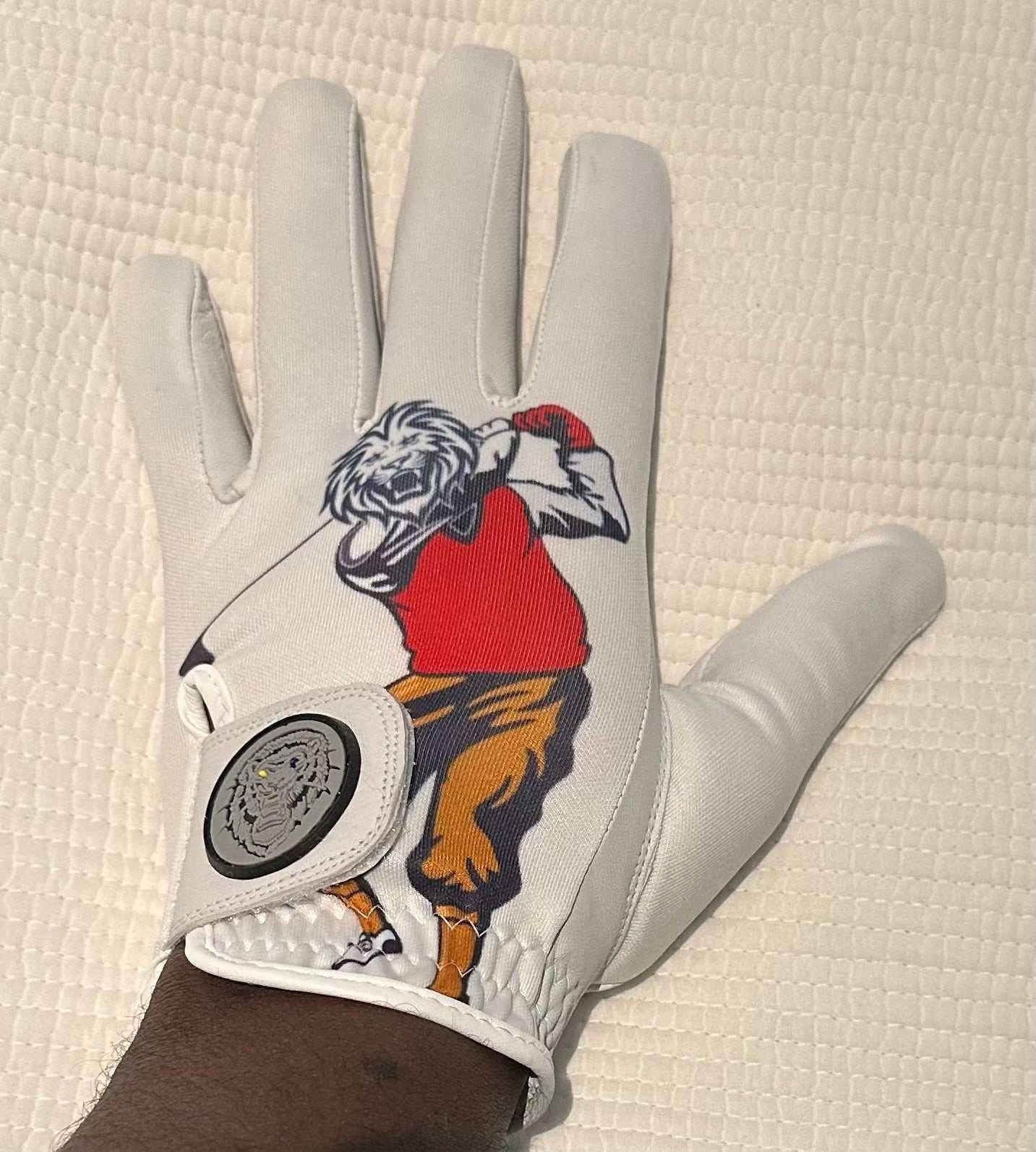 Black Lion Golfer glove with leather front, breathable back, rubber strap, and inverse stitching for enhanced grip and style